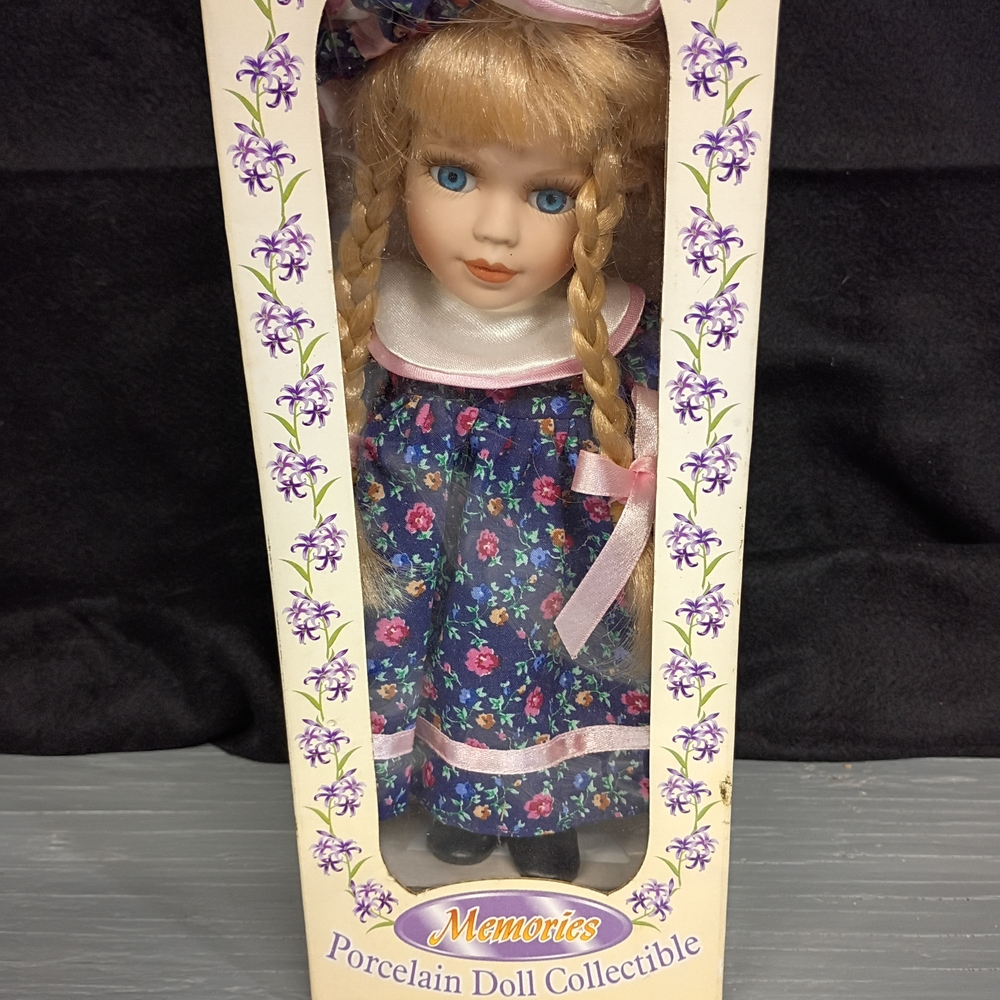 Porcelain Doll with Floral Blue Dress